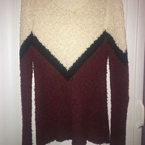 Red, cream, black sweater